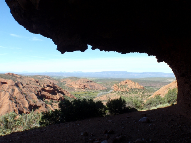 Looking through the arch to more conglomerate hills. 