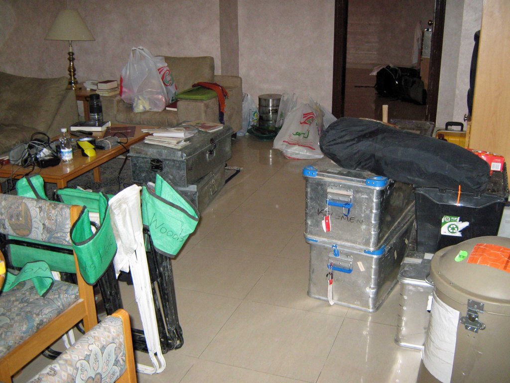 Boxes and boxes of scientific and camping supplies in a hotel room in Muscat, Sultanate of Oman, 2009. 