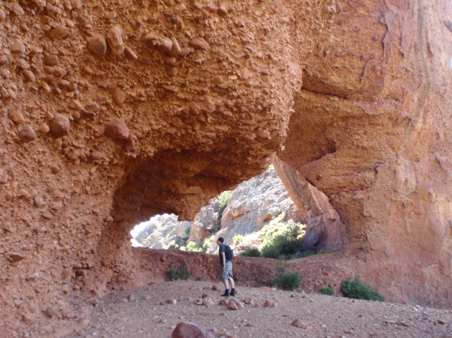Standing in the conglomerate rock arch. 