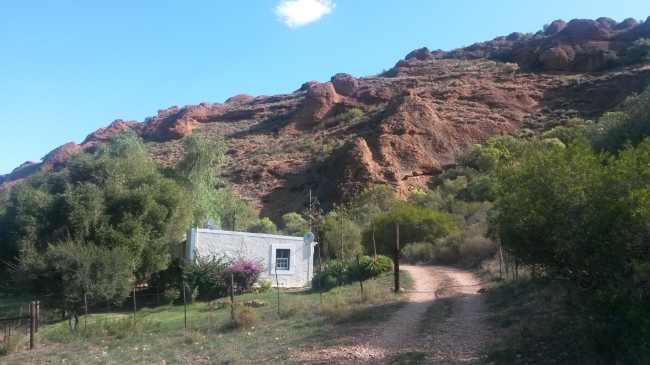 The lovely guest cottage where we stayed, nestled at the foot of one of the red conglomerate hills. 